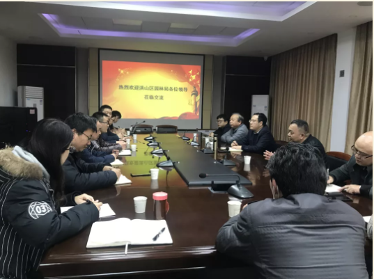 区院交流谋合作  科技推广开好局